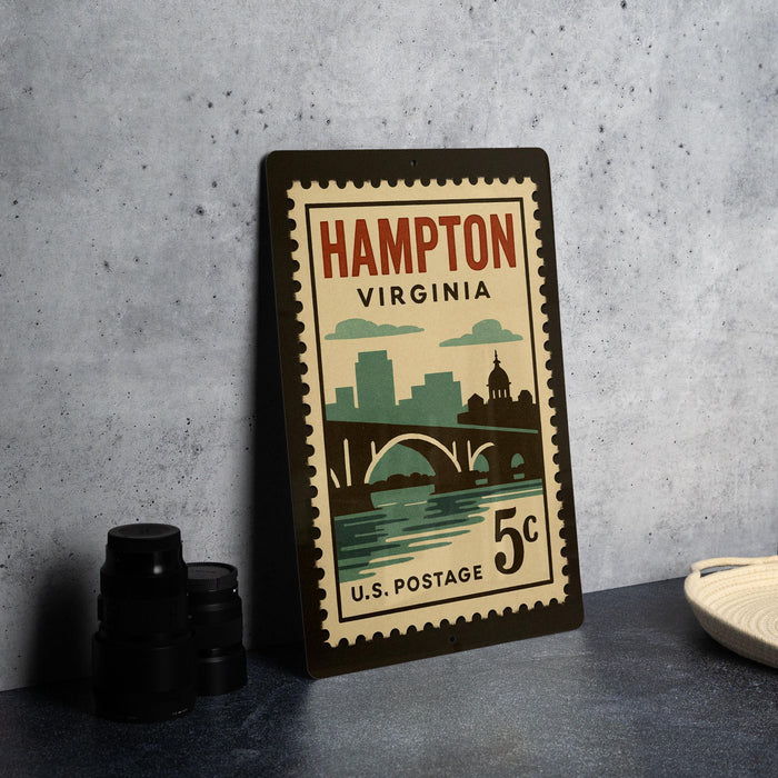 A vintage postage stamp from the United States of America, featuring the city of Hampton, Virginia, with a bridge and waterway.