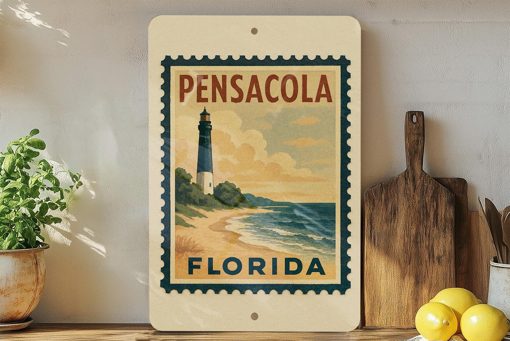 A framed vintage-style poster of a lighthouse in Pensacola, Florida, with the text "PENSACOLA FLORIDA" on it, is displayed on a shelf next to a wooden cutting board and some kitchen utensils.