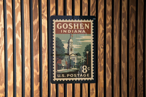 A vintage postage stamp from the United States, featuring an illustration of a building and a clock, mounted on a wooden wall.