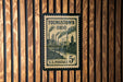 A U.S. postage stamp from Youngstown, Ohio, featuring an illustration of a steam-powered train and industrial buildings.