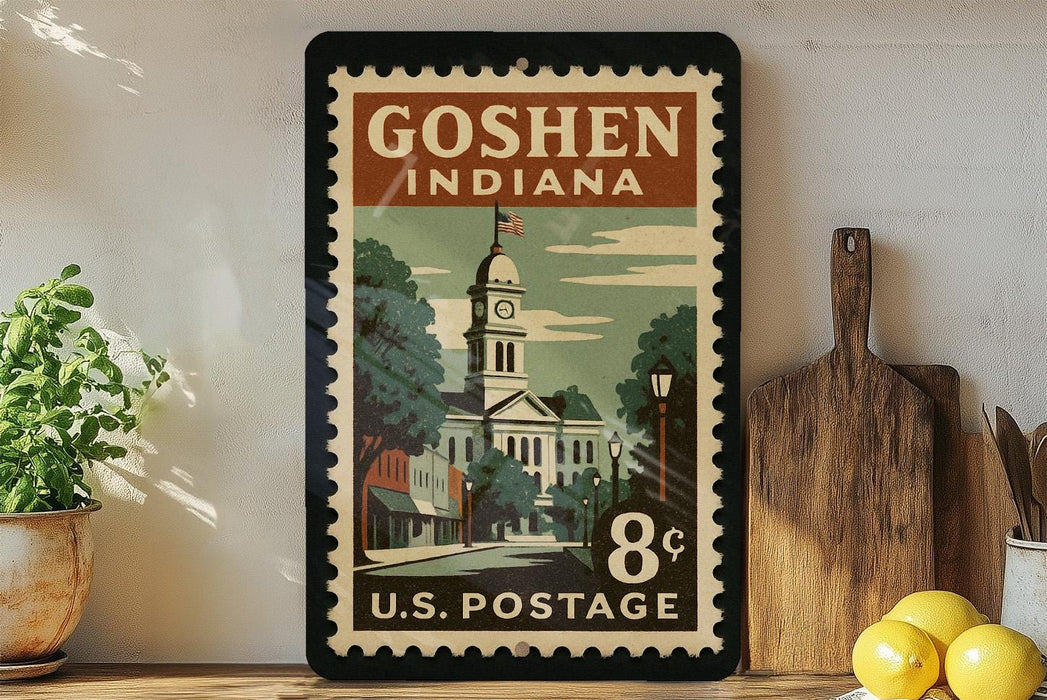 A vintage postage stamp from Goshen, Indiana, displayed on a shelf next to a wooden cutting board and some potted plants.