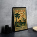 A metal stamp depicting a cityscape with a palm tree, surrounded by buildings, with the text "CAROLINA 7c PUERTO RICO" printed on it.
