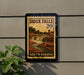 A sign for Sioux Falls, South Dakota, featuring a scenic illustration of the falls.
