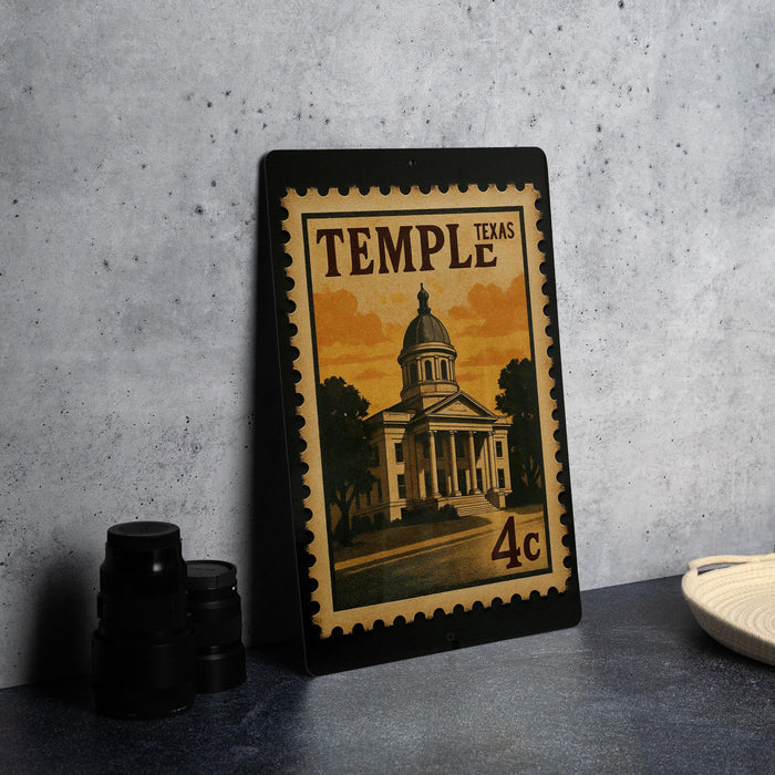 A framed image of a building, likely a historic landmark, is displayed on a table.
