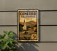 A postage stamp from Concord, California, featuring a church and a road, mounted on a wall.