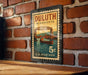 A vintage postage stamp from Duluth, Minnesota, featuring a bridge and boats, is displayed on a brick wall.