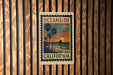 A vintage-style sign for Oceanside, California, featuring palm trees and a sunset over the ocean.