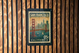 A postage stamp from San Francisco, California, featuring the Golden Gate Bridge and the city skyline.