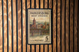 A U.S. postage stamp from Parkersburg, West Virginia, featuring a bridge and a clock tower.