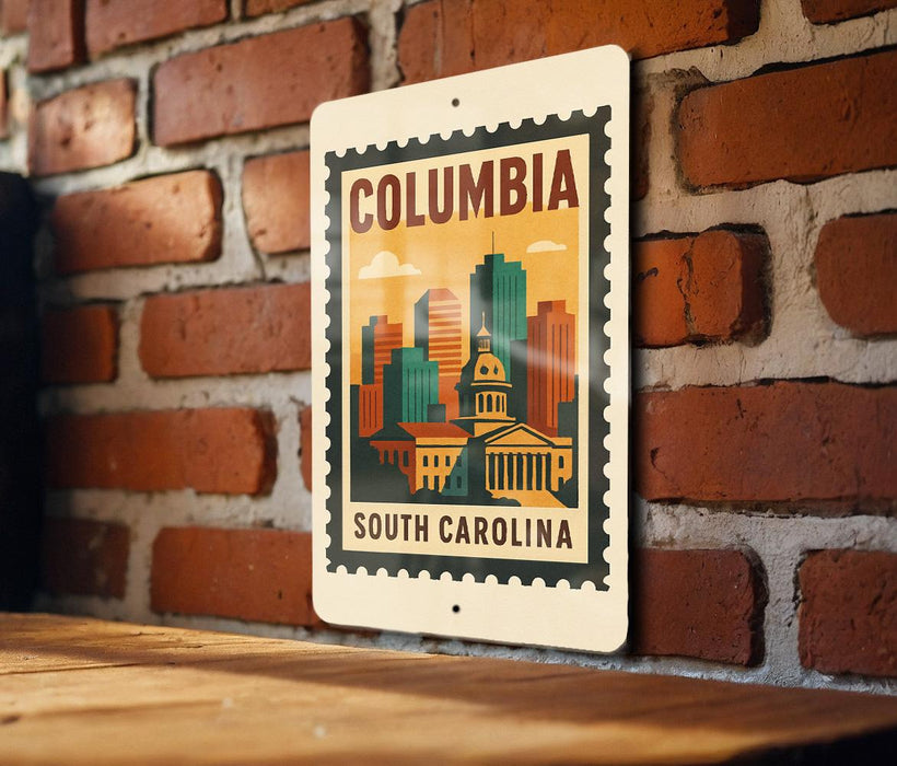 A metal sign with a colorful illustration of a city skyline and the text "COLUMBIA SOUTH CAROLINA" is displayed on a brick wall.