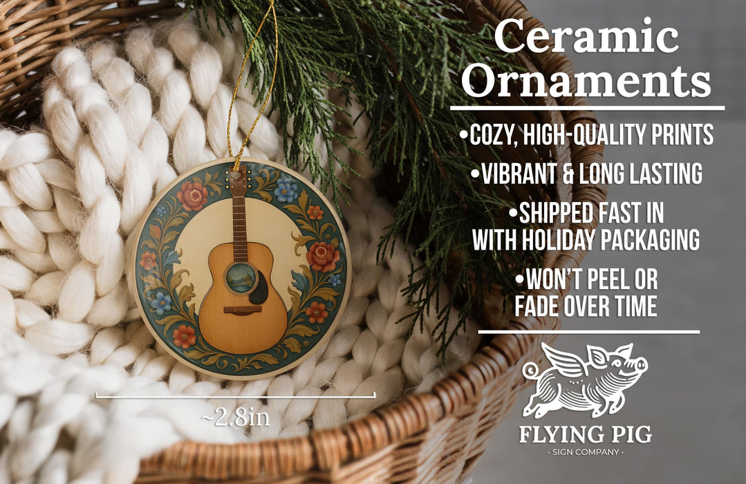 Ceramic ornaments, featuring a guitar-shaped ornament with a floral design, are displayed in a wicker basket.