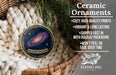 Ceramic ornaments, specifically a ceramic ornament with the word "ANDROMEDA" on it, are displayed in a wicker basket.