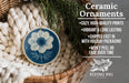 Ceramic ornaments, featuring a blue and white floral design, are displayed in a woven basket.