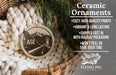 Ceramic ornaments, featuring a ceramic ornament with a mountain and airplane design, hanging in a wicker basket.