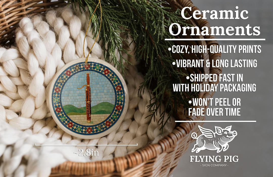 Ceramic ornaments, featuring a colorful design with a musical instrument, are displayed in a woven basket.