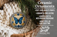 Ceramic ornaments, featuring a butterfly design, are displayed in a wicker basket.