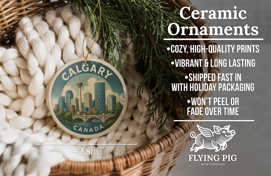 Ceramic ornaments, including a round ornament with a cityscape design, are displayed in a woven basket.