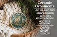Ceramic ornaments, including a round ornament with a cityscape design, are displayed in a woven basket.