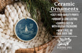 Ceramic ornaments, featuring a blue and white design with a fire pit and chairs, are displayed in a woven basket.