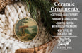Ceramic ornaments, featuring a person carrying a canoe, are displayed in a basket with pine branches.