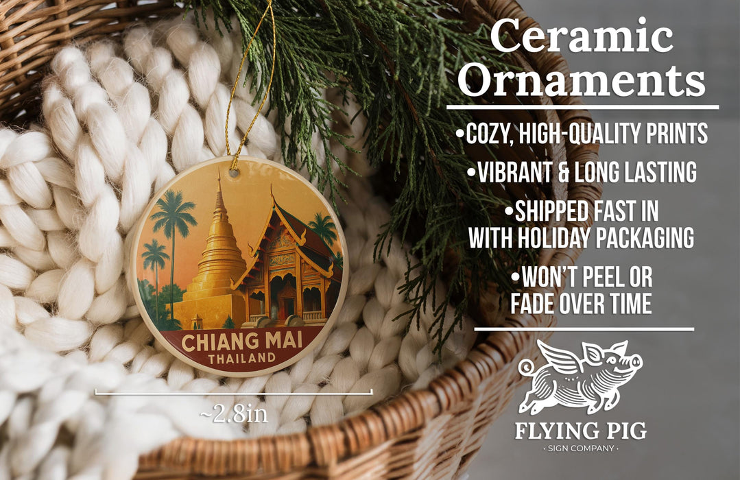 Ceramic ornaments, specifically a ceramic ornament with a picture of a temple in Thailand, are displayed in a woven basket.