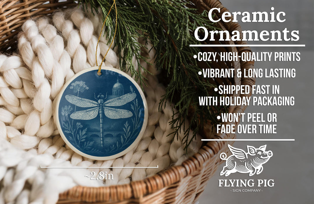 Ceramic ornaments, featuring a dragonfly design, are displayed in a woven basket.