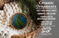 Ceramic ornaments, featuring a stained glass design of a fern, are displayed in a woven basket.