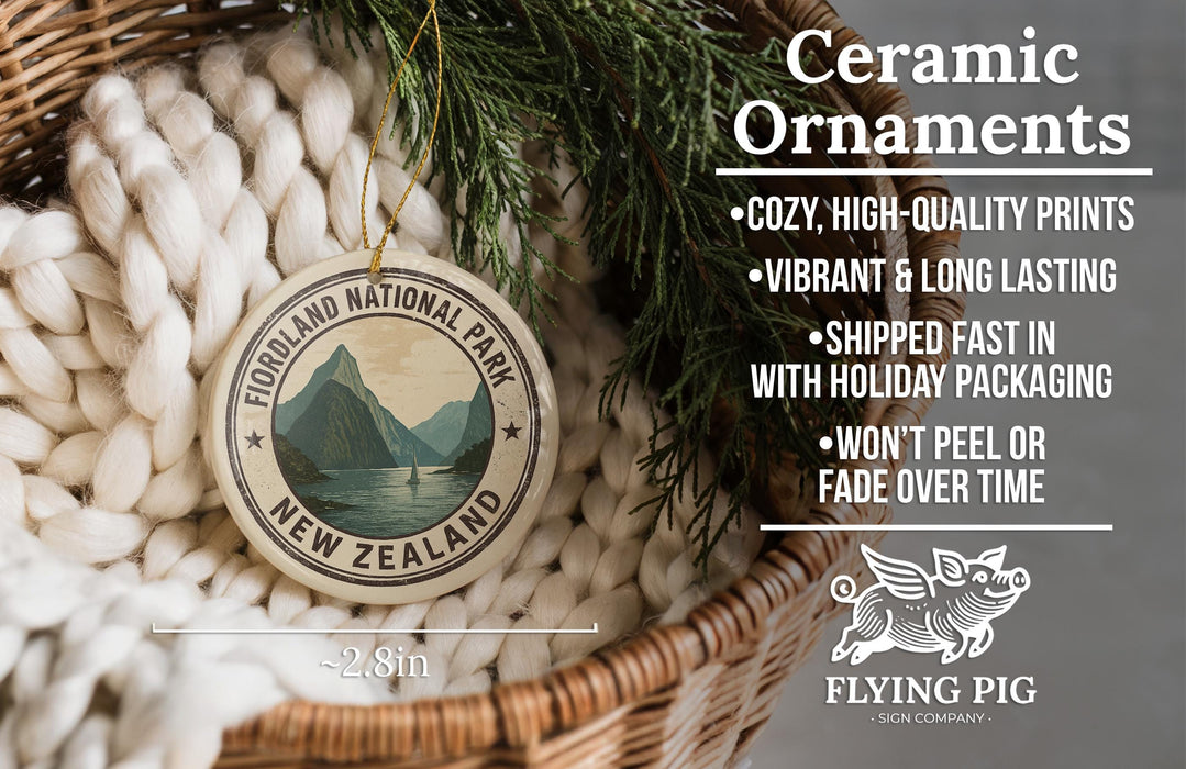 Ceramic ornaments, featuring a design of a mountain landscape, are displayed in a woven basket.