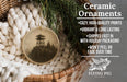 Ceramic ornaments, featuring a black and white image of a tower surrounded by pine trees, are displayed in a wicker basket.