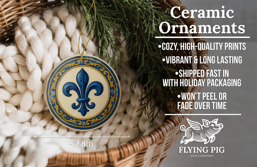Ceramic ornaments, featuring a fleur-de-lis design, are displayed in a wicker basket.