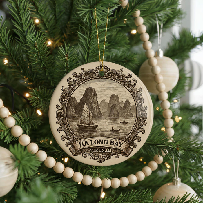 A Christmas tree decorated with ornaments, including a circular ornament with a sailing boat and the text "HA LONG BAY VIRTHAM".