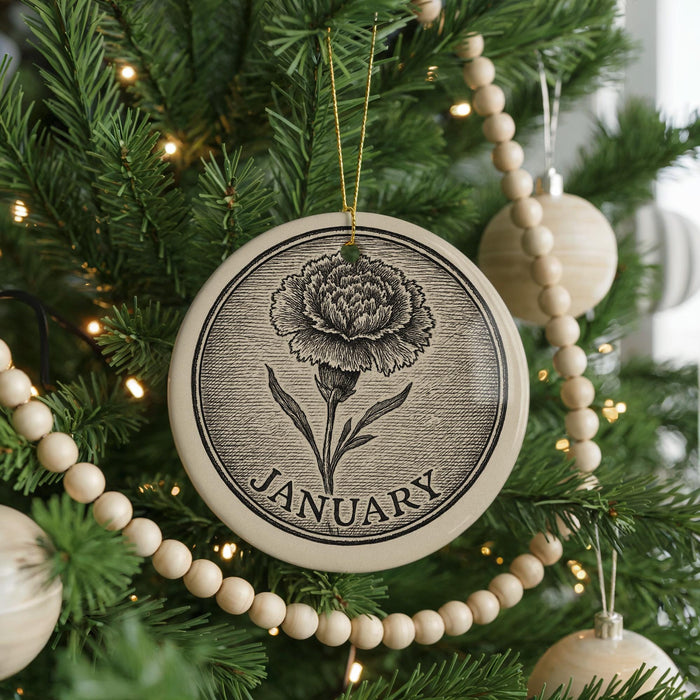 A Christmas tree decorated with a circular ornament featuring a large flower, surrounded by beaded ornaments and twinkling lights.