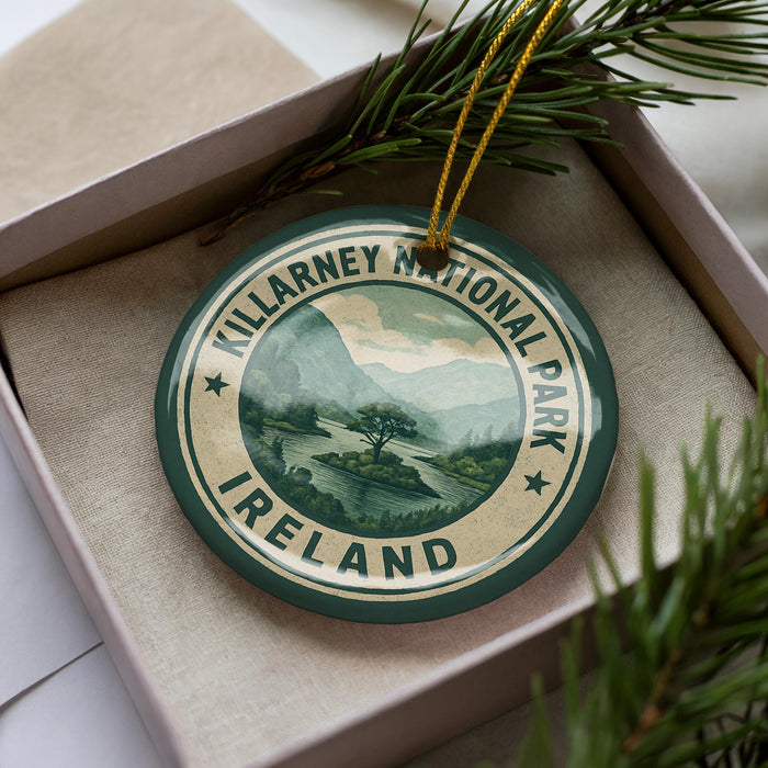 A circular ornament with the text "KILLARNEY NATIONAL PARK IRELAND" printed on it, surrounded by pine branches.