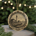 A decorative ornament featuring a lighthouse and a coastal scene, with the text "PORTLAND HEAD LIGHT" prominently displayed.