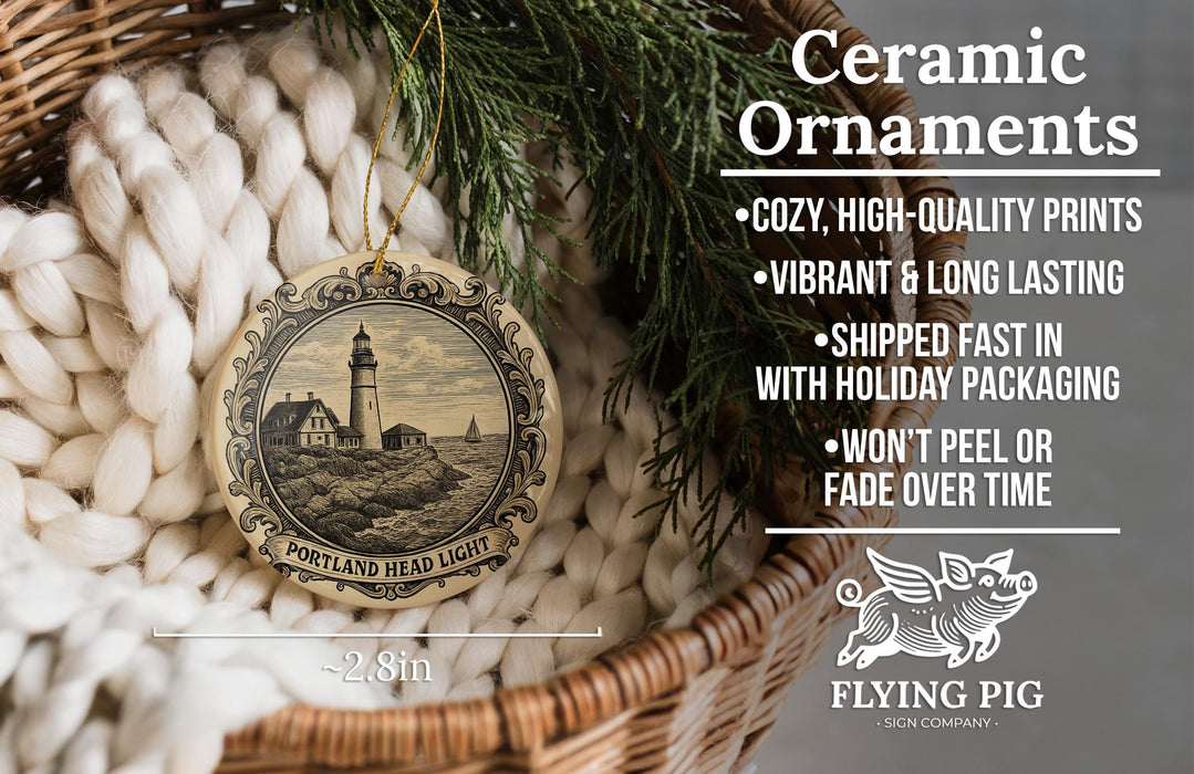 Ceramic ornaments, featuring a lighthouse and Portland Head Light, are displayed in a woven basket.
