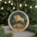 A decorative ornament featuring a bull with horns and a starry night sky, representing the zodiac sign Taurus.