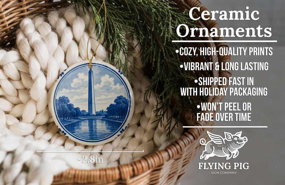 Ceramic ornaments, featuring a blue and white design of the Washington Monument, are displayed in a woven basket.