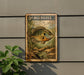 A 5-cent postage stamp featuring a bluegill fish is displayed on a wall, with a plant to the left.