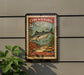 A vintage-style metal sign with a fish illustration and text, mounted on a wall next to a plant.