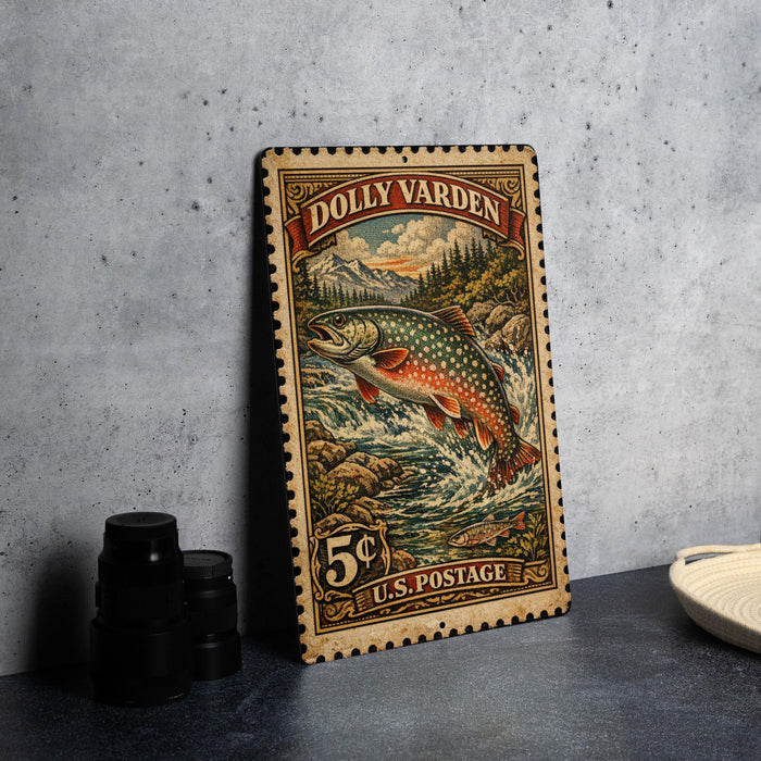 A vintage postage stamp featuring a fish, likely a trout, is displayed on a table next to some black camera lenses.