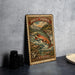 A vintage postage stamp featuring a fish, likely a trout, is displayed on a table next to some black camera lenses.
