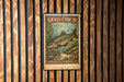 A vintage-style metal sign with a fish illustration and text, mounted on a wooden wall.