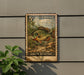 A vintage U.S. postage stamp featuring a green sunfish is displayed on a wall, with a plant to the left.