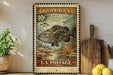 A vintage-style postage stamp featuring a large fish, placed on a wooden surface next to a wooden cutting board and some lemons.