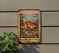 A vintage-style postage stamp featuring a rockfish, mounted on a wall next to a plant.