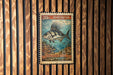 A 20c roosterfish postage stamp is displayed on a wooden wall.