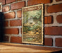 A U.S. postage stamp featuring a striped bass is displayed on a brick wall.