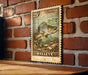 A weathered U.S. postage stamp featuring a walleye fish, mounted on a brick wall.