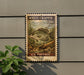 A vintage-style postage stamp featuring a white crappie fish, mounted on a wall next to a plant.