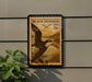 A postage stamp featuring a black skimmer bird is displayed on a wall, with a plant to the left.